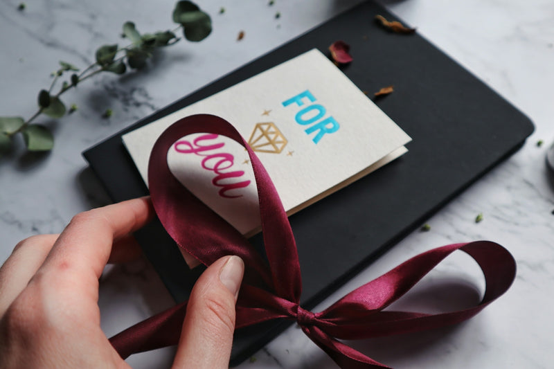 for you card with red ribbon