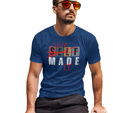 We Made It T-Shirt – Because Success Is a Team Sport, model wearing blue tee with motivational graphic.