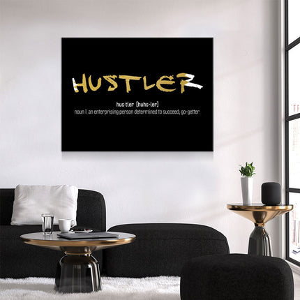 Hustler Definition Canvas Wall Art displayed in modern living room, motivational wall decor with success quote.