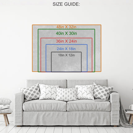 Size guide for canvas wall art showing dimensions on a wall above a cozy sofa.