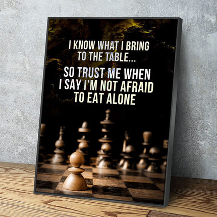 I Know What I Bring To The Table” Canvas Wall Art | Chess-Inspired Motivational Quote displayed on a wooden shelf.