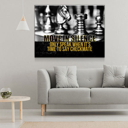 Move In Silence Canvas Wall Art, Checkmate, Motivational Wall Decor, Chess Quote on a wall above a gray sofa.