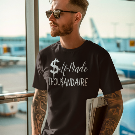 Self-Made Thousandaire T-Shirt | Entrepreneurs on the Rise worn by a man at the airport.
