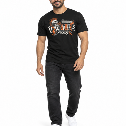 A man modeling a black short-sleeve graphic t-shirt with 'UNLEASH' and 'BORN TO WIN' text, paired with dark gray jeans and white sneakers, against a plain white background.