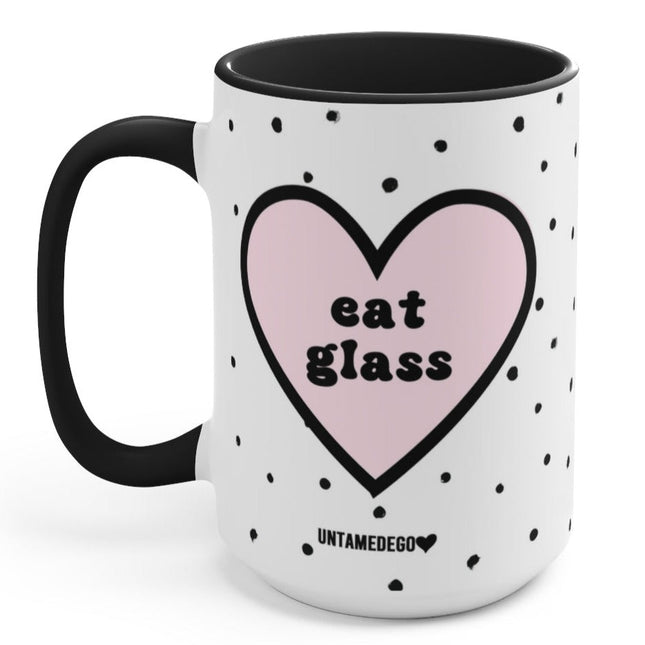 Mug with pink heart and 'eat glass' text on a white background