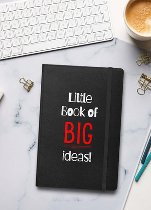 Entrepreneur Notebook - Little Book of BIG Ideas on a desk with coffee and stationery.