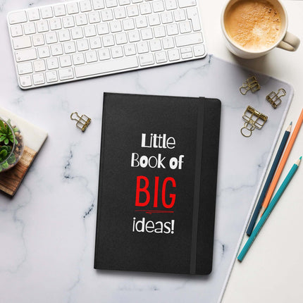 Entrepreneur Notebook - Little Book of BIG Ideas on a desk with coffee and stationery.