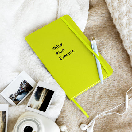 Think Plan Execute Journal – Strategic Notebook for Founders and Goal-Getters in vibrant green color with pen on cozy surface.