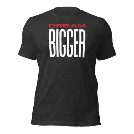 Dream Bigger T-Shirt – Because Playing Small Isn’t an Option, featuring bold lettering on a stylish cotton tee.
